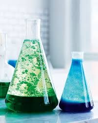 Two glass beakers green and blue liquids | Street Science